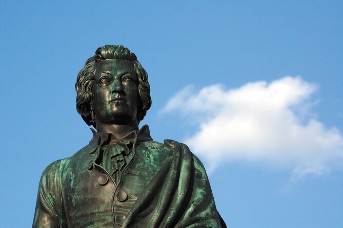 Salzburg On the Traces of Mozart Private Tour - Mozartplatz and the University Aula: The Meaning Behind the Statues